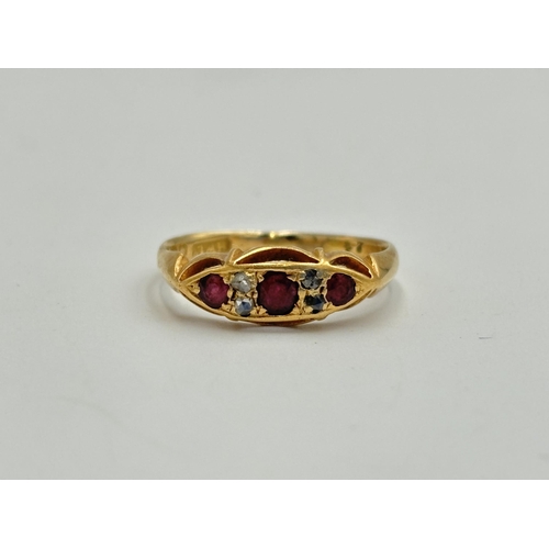 2194 - An early 20th century hallmarked Birmingham 18ct gold ruby and diamond ring, size S - approx. gross ... 