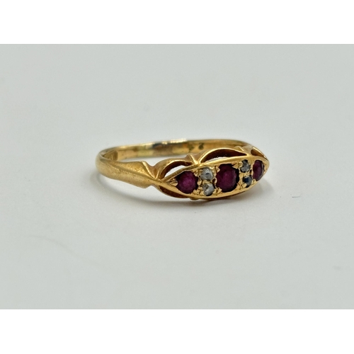 2194 - An early 20th century hallmarked Birmingham 18ct gold ruby and diamond ring, size S - approx. gross ... 