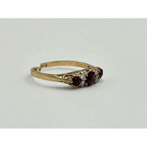 2195 - A hallmarked London 9ct gold ruby and CZ ring - approx. gross weight 1.3g