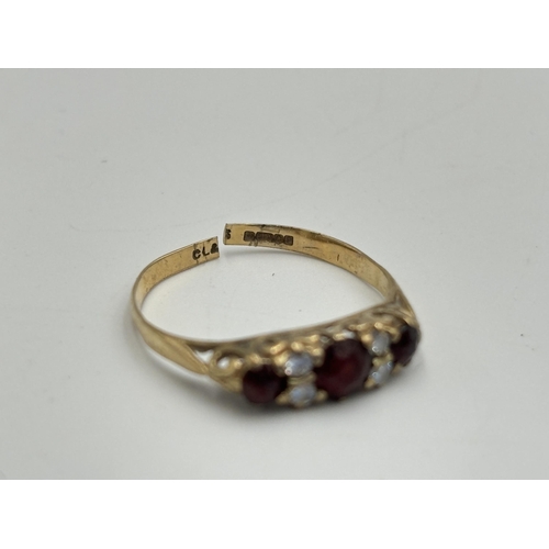 2195 - A hallmarked London 9ct gold ruby and CZ ring - approx. gross weight 1.3g