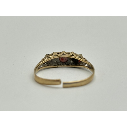 2195 - A hallmarked London 9ct gold ruby and CZ ring - approx. gross weight 1.3g