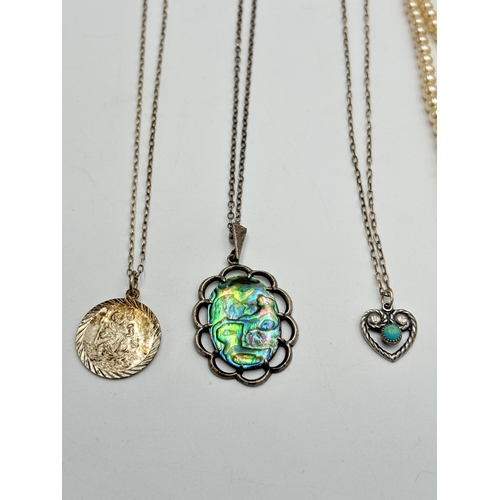 2211 - A collection of silver jewellery to include abalone shell pendant necklace, marcasite butterfly broo... 