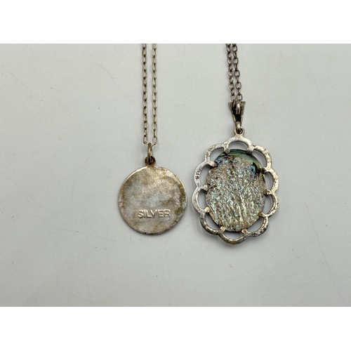 2211 - A collection of silver jewellery to include abalone shell pendant necklace, marcasite butterfly broo... 