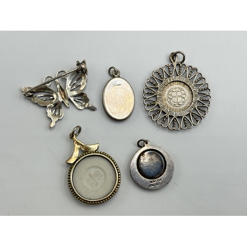 2211 - A collection of silver jewellery to include abalone shell pendant necklace, marcasite butterfly broo... 