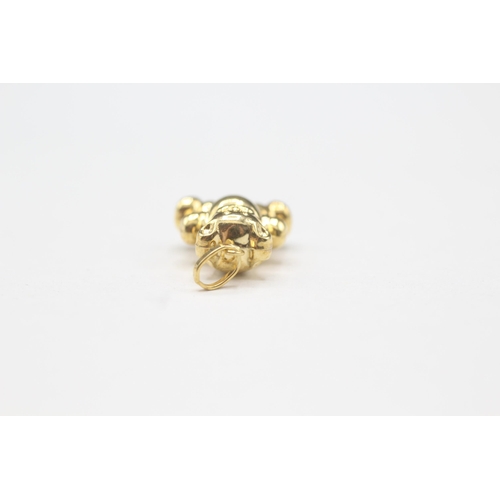 2108 - A 9ct gold teddy bear charm - approx. gross weight 0.6g