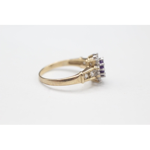 2111 - A 9ct gold amethyst and cubic zurconia halo ring - approx. gross weight 2.1g