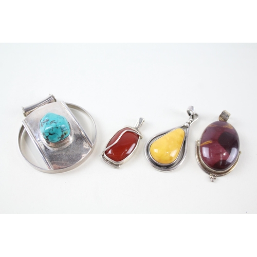 2148 - Four sterling silver gemstone pendants to include amber, turquoise etc. - approx. gross weight 67g