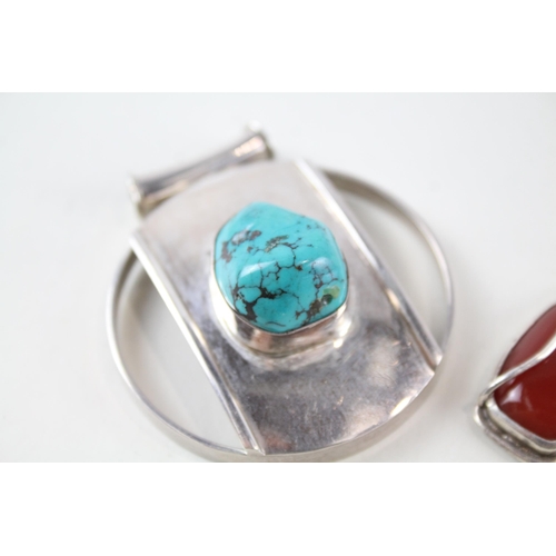 2148 - Four sterling silver gemstone pendants to include amber, turquoise etc. - approx. gross weight 67g