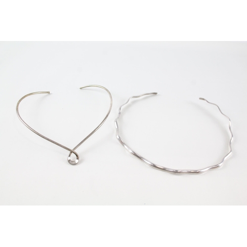 2149 - Two sterling silver torque necklaces - approx. gross weight 50g