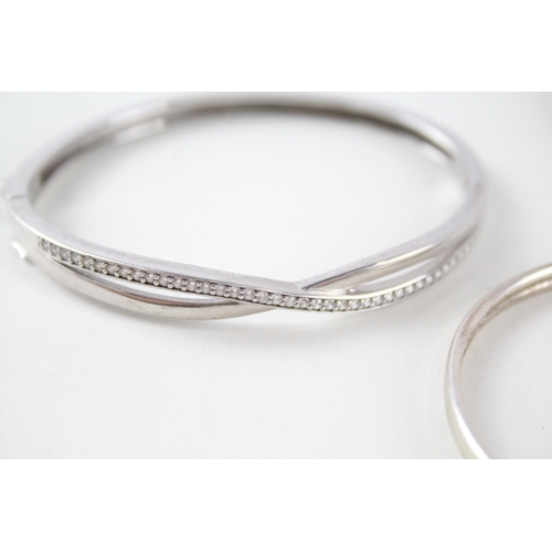 2155 - Four sterling silver bangles - approx. gross weight 41g