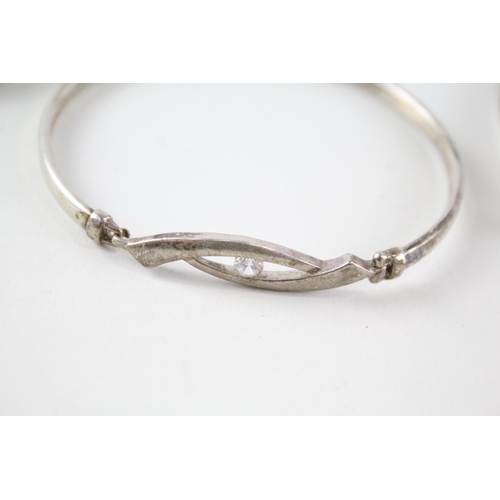 2155 - Four sterling silver bangles - approx. gross weight 41g