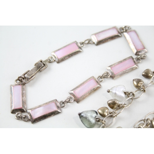 2163 - Four sterling silver bracelets to include agate, glass, mother of pearl etc. - approx. gross weight ... 