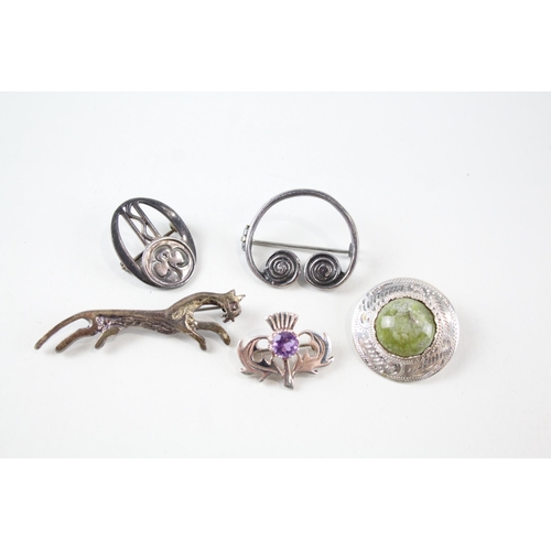 2165 - Five Scottish sterling silver brooches to include Kit Heath, amethyst etc. - approx. gross weight 21... 