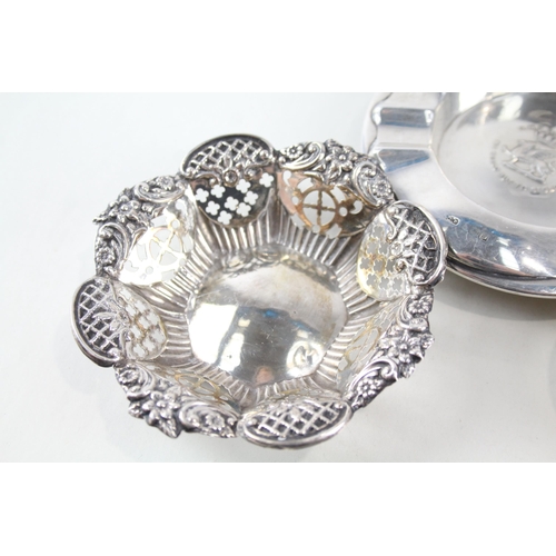 2304 - Three silver trinket dishes, two hallmarked sterling silver and one .900 - approx. gross weight 94g