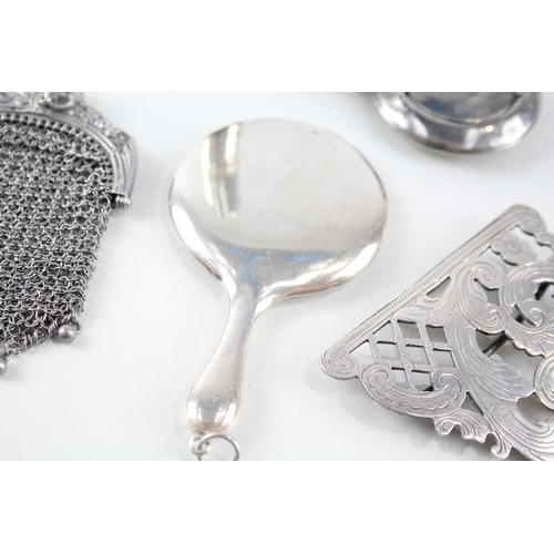 2307 - Five .925 sterling silver items to include coin purse, novelty dressing table mirror necklace pendan... 