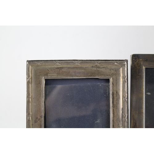 2309 - Three hallmarked sterling silver photo frames - largest approx. 18.5cm high x 14cm wide