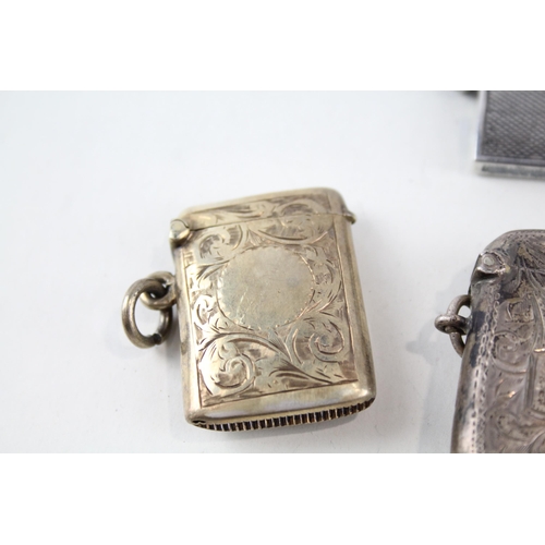 2313 - Four .925 sterling silver tobacciana accessories, three vesta cases and one cigar cutter - approx. g... 