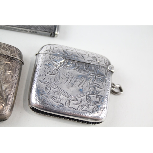 2313 - Four .925 sterling silver tobacciana accessories, three vesta cases and one cigar cutter - approx. g... 