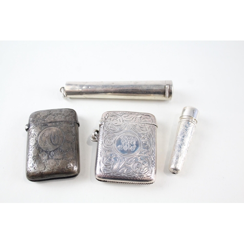 2320 - Four .925 sterling silver tobacciana accessories, two vesta cases and two cheroot cases - approx. gr... 