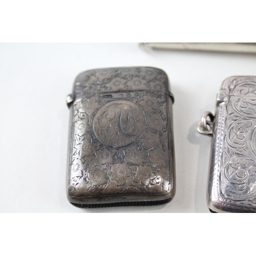 2320 - Four .925 sterling silver tobacciana accessories, two vesta cases and two cheroot cases - approx. gr... 