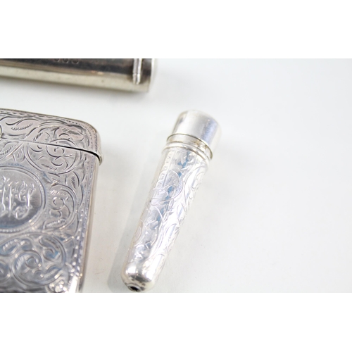 2320 - Four .925 sterling silver tobacciana accessories, two vesta cases and two cheroot cases - approx. gr... 