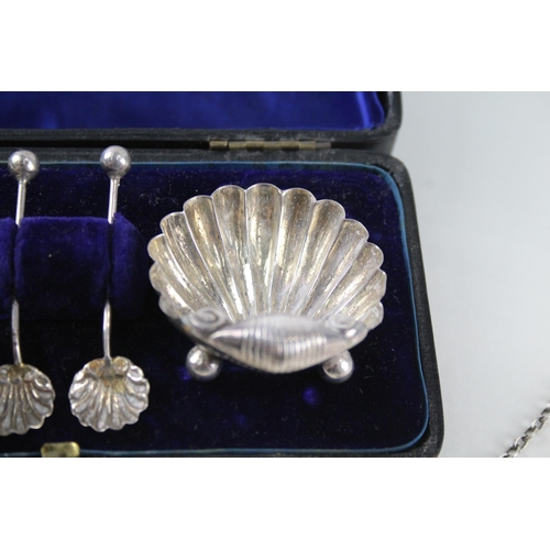 2323 - Six .925 sterling silver items, two decanter labels and a pair of cased shell shaped condiment dishe... 