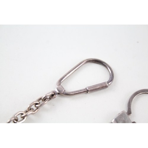 2324 - Two .925 sterling silver keyrings - approx. gross weight 33g