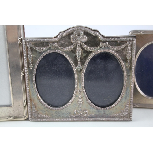 2325 - Three hallmarked sterling silver photograph frames - largest approx. 21.5cm high x 16cm high