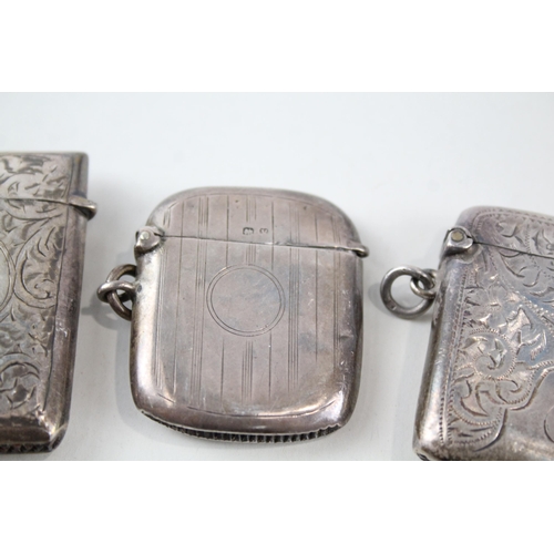 2330 - Four pieces of antique hallmarked silver, three vesta cases and one cigar cutter - approx. gross wei... 