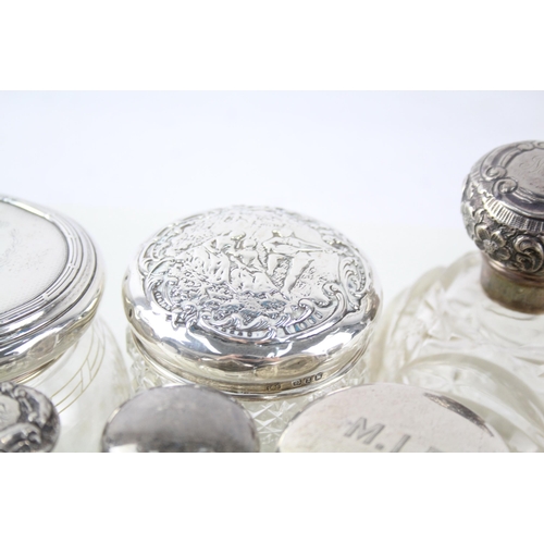 2331 - Eight .925 sterling silver and cut glass dressing table jars/bottles