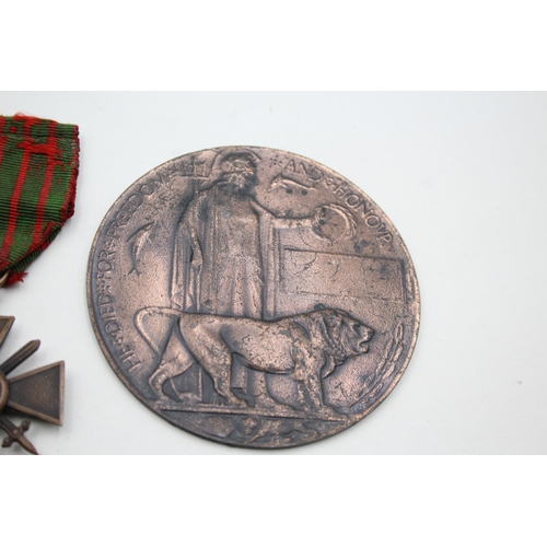 2358 - Four pieces of militaria, one WWI Princess Mary Christmas tin, one French Croix De Guerre medal, one... 