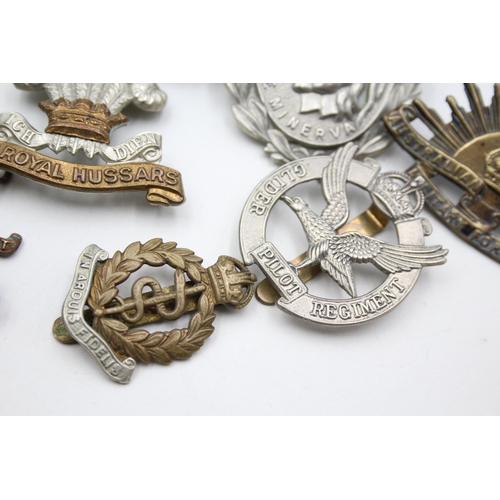 2359 - Ten military cap badges