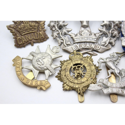 2368 - Ten military cap badges