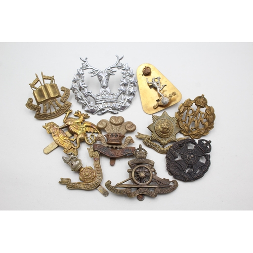 2371 - Ten military cap badges