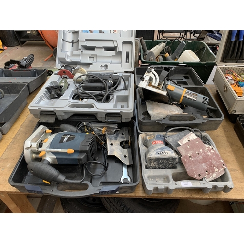Four cased power tools, one Ryobi sander, one Rotozip Rebel spiral saw