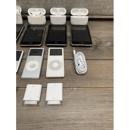 A collection of Apple items to include Airpod pro headphones, Airpod ...