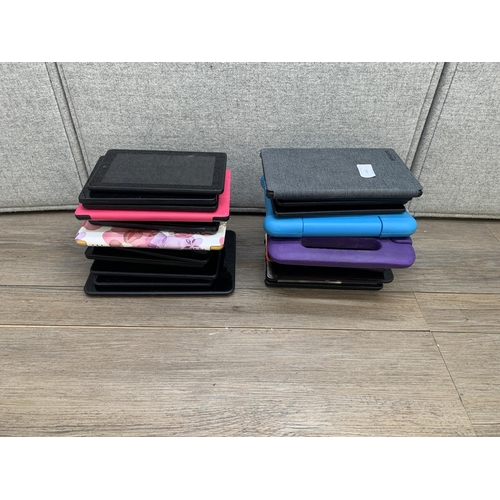 A collection of Amazon Kindle and Fire tablets