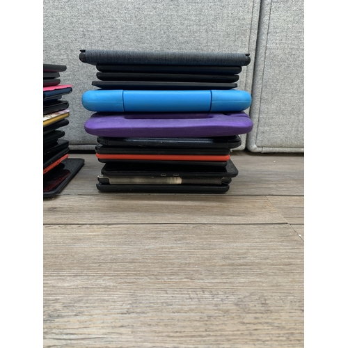 A collection of Amazon Kindle and Fire tablets