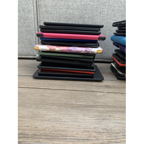 A collection of Amazon Kindle and Fire tablets