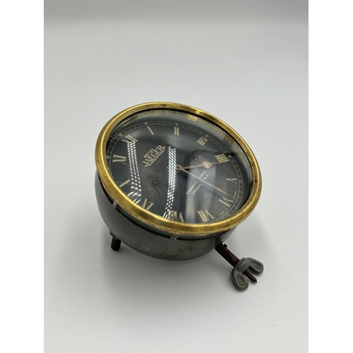 2280 - An early 20th century British Jaeger 8 Day car dashboard clock - approx. 8.5cm diameter