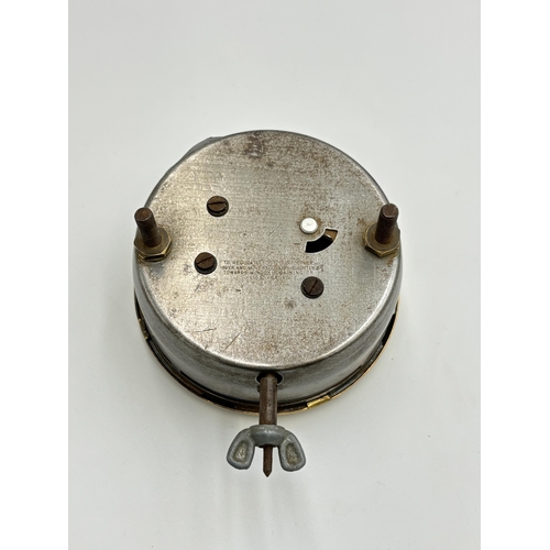 2280 - An early 20th century British Jaeger 8 Day car dashboard clock - approx. 8.5cm diameter