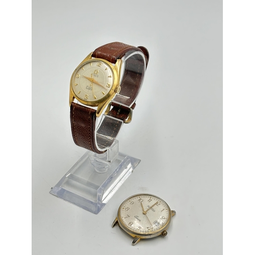 2292 - Two men's wristwatches, one Titus De Luxe hand wind and one Roamer quartz