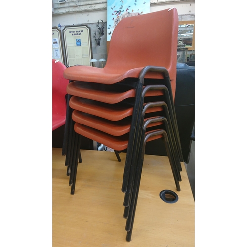 74 - Seven pieces of furniture, five mid/late 20th century Restall red plastic and tubular metal stacking... 