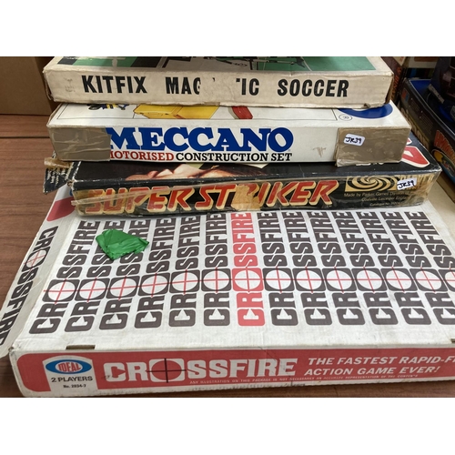 435 - Seven vintage board games to include Super Striker, Crossfire, Meccano, Kit Fix Magnetic Soccer,  Tw... 