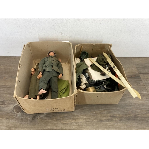 440 - Three 1960s Action Man figurines together with a large collection of Action Man clothing and accesso... 