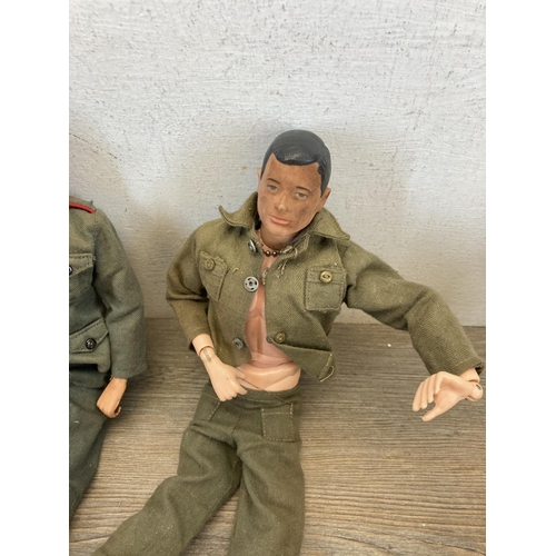 440 - Three 1960s Action Man figurines together with a large collection of Action Man clothing and accesso... 