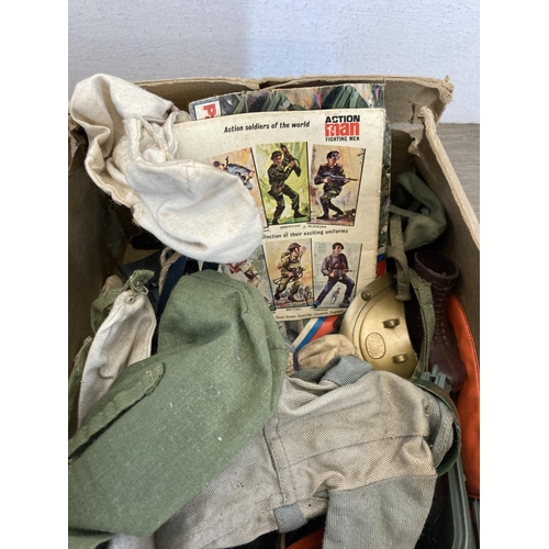 440 - Three 1960s Action Man figurines together with a large collection of Action Man clothing and accesso... 