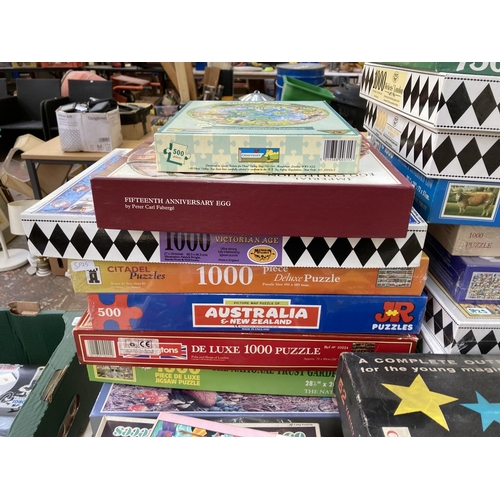 442 - A large collection of board games and jigsaw puzzles to include Disneyland, Chess etc.