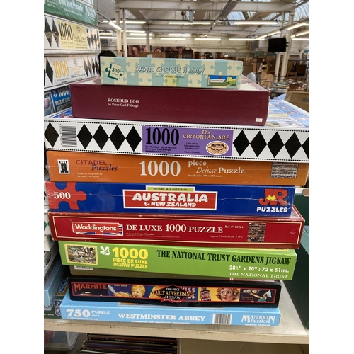 442 - A large collection of board games and jigsaw puzzles to include Disneyland, Chess etc.