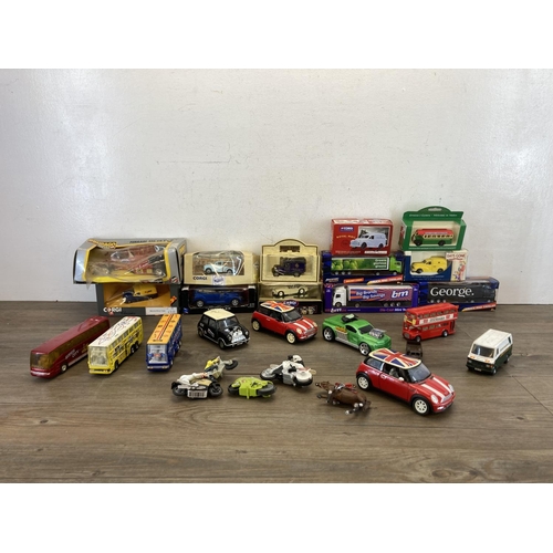 454 - A collection of diecast model vehicles to include boxed Bburago Ferrari 126 C4 Turbo, Corgi Classic ... 